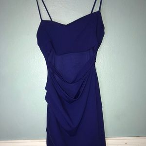 Two slits across abdomen, Mild thigh slit, Used once. Medium.
